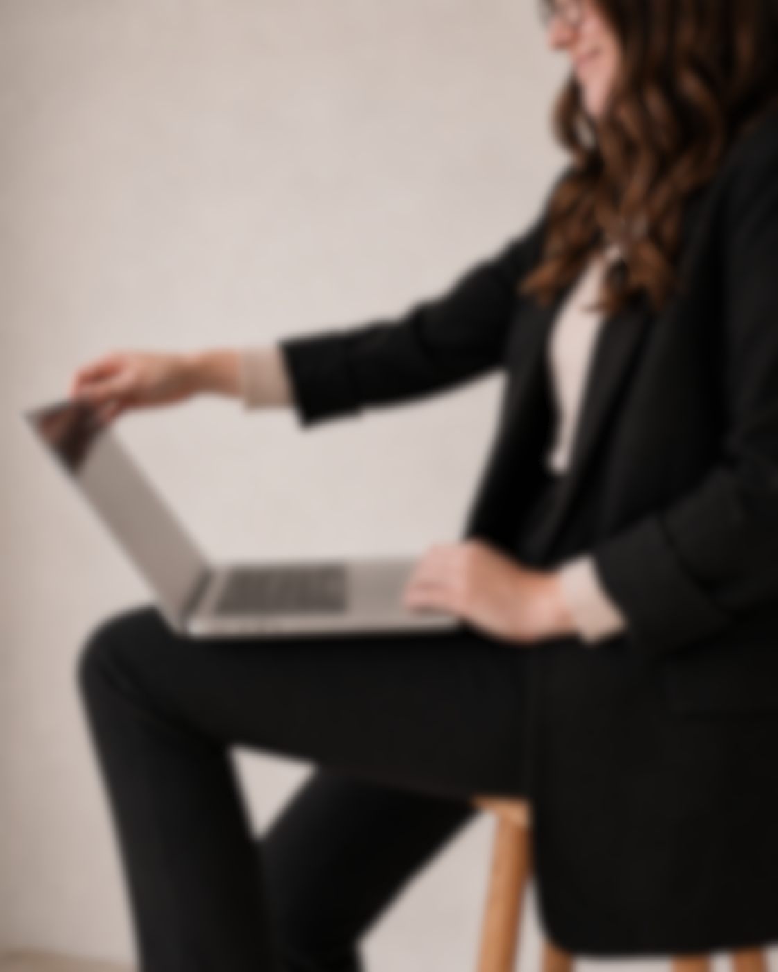Jasmine Radi building a client website at her laptop in Fargo